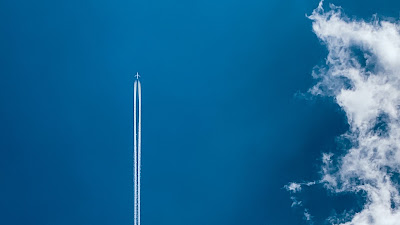 Plane in the blue sky leaving long white footpath

 + Download Wallpapers