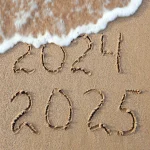 2024, 2025 years written on sandy beach sea. wave washes away 20