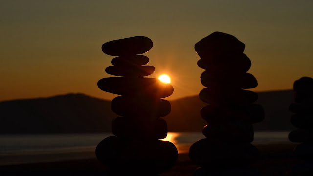 Wallpaper Stone pile at sunset+ Wallpapers Download