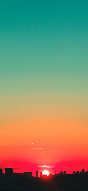 Orange and blue sky during sunset wallpaper.jpg