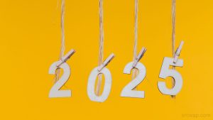 New year 2025 concepts clipped cards on yellow background photo