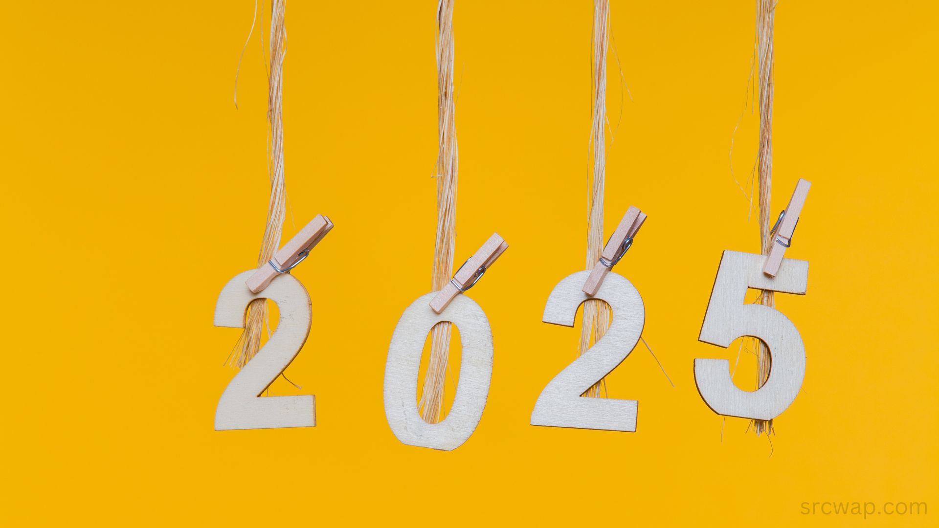 New year 2025 concepts clipped cards on yellow background photo